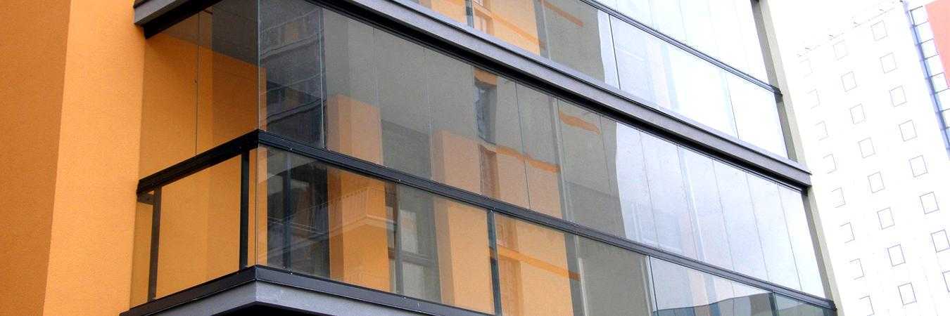 Безрамное остекление балконов и лоджий: плюсы и минусы